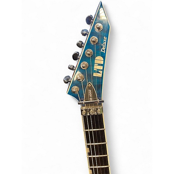 Used ESP LTD MH1000 Deluxe Trans Blue Solid Body Electric Guitar