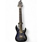 Used Schecter Guitar Research Hellraiser C8 Trans Black Solid Body Electric Guitar thumbnail