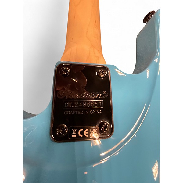 Used Jackson JS1M Turquoise Electric Bass Guitar