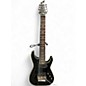 Used Schecter Guitar Research Hellraiser C8 8 Floyd Rose Black Solid Body Electric Guitar thumbnail