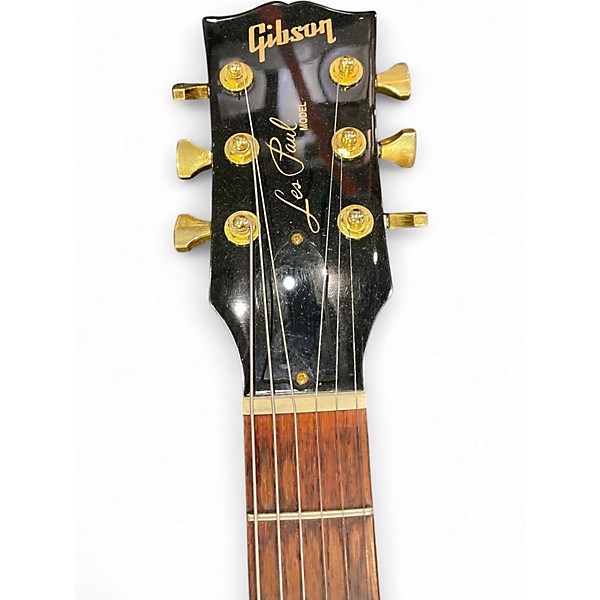 Used Gibson Les Paul Studio Black and Gold Solid Body Electric Guitar