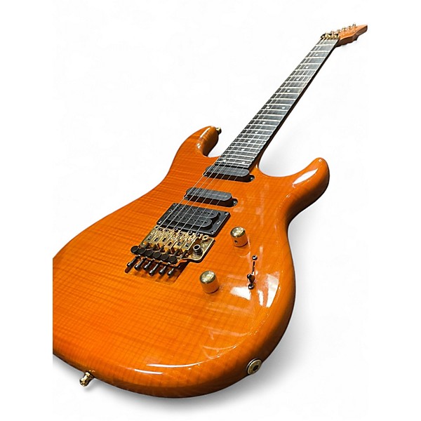 Vintage 1994 Carvin DC135 Trans Amber Solid Body Electric Guitar