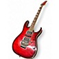 Used Ibanez RG4EXQM1 Trans Red Solid Body Electric Guitar