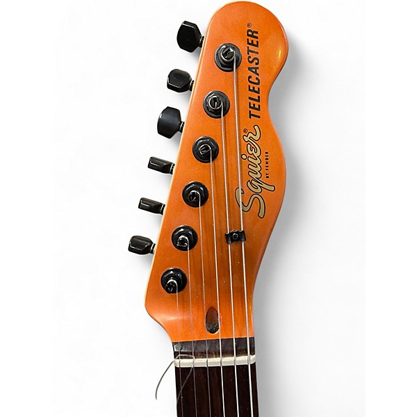 Used Fender squier telecaster ( converted too left) Metallic Orange Solid Body Electric Guitar