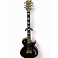 Used ESP LTD EC1000 Deluxe Black and Gold Solid Body Electric Guitar thumbnail