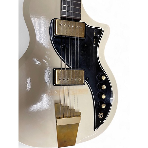 Vintage 1957 Supro Dual Tone White Solid Body Electric Guitar