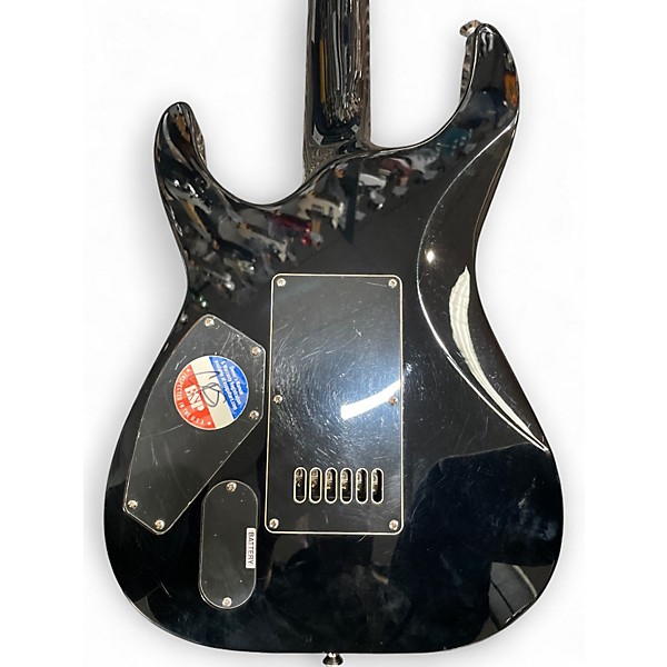 Used ESP LTD MH1000 with Evertune Black Solid Body Electric Guitar