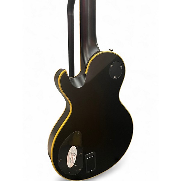 Used Schecter Guitar Research Blackjack ATX Solo 6 Black and Gold Solid Body Electric Guitar