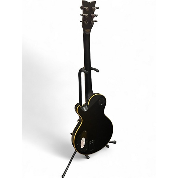 Used Schecter Guitar Research Blackjack ATX Solo 6 Black and Gold Solid Body Electric Guitar