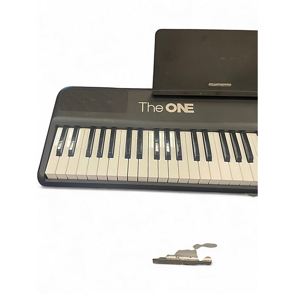 Used The ONE Music Group Color Portable Keyboard