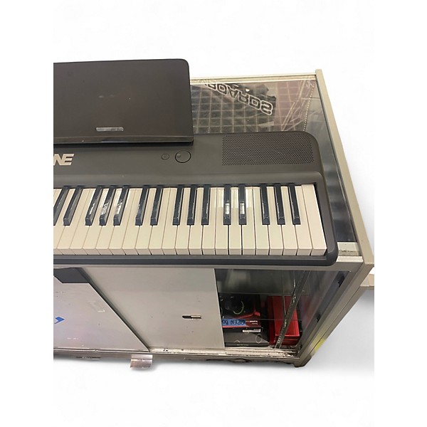 Used The ONE Music Group Color Portable Keyboard
