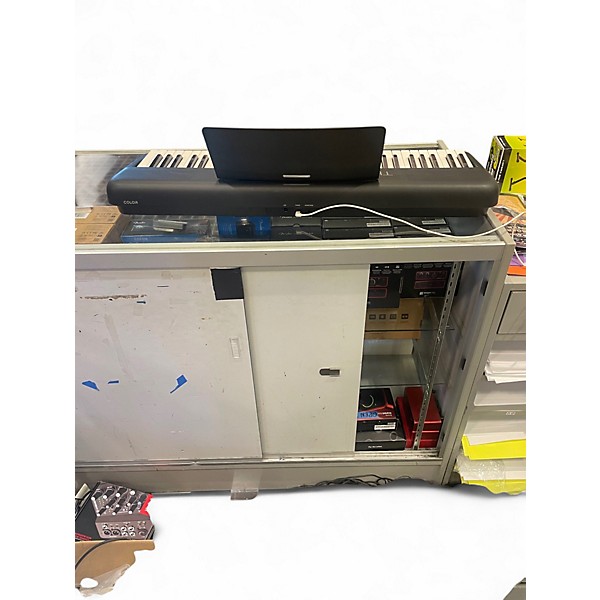 Used The ONE Music Group Color Portable Keyboard