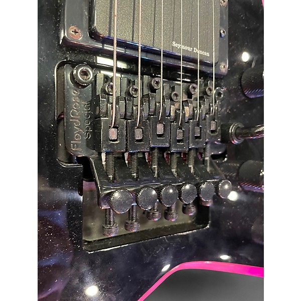 Used Jackson RRXMG Randy Rhoads Black and Pink Solid Body Electric Guitar