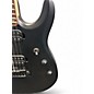 Used Sterling by Music Man John Petrucci JP157 7 String Stealth Black Solid Body Electric Guitar