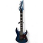 Used Ibanez RG653DX Trans Blue Solid Body Electric Guitar thumbnail