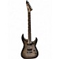 Used ESP LTD MH1000 Deluxe Trans Charcoal Solid Body Electric Guitar thumbnail