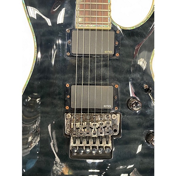 Used ESP LTD MH1000 Deluxe Black Solid Body Electric Guitar