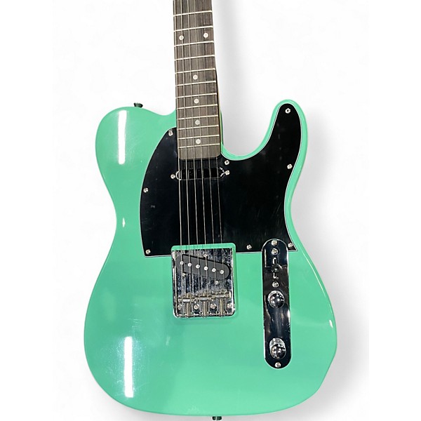 Used Sawtooth ET Teal Solid Body Electric Guitar