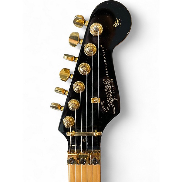 Used Squier Pro Tone Stratocaster Black and Gold Solid Body Electric Guitar