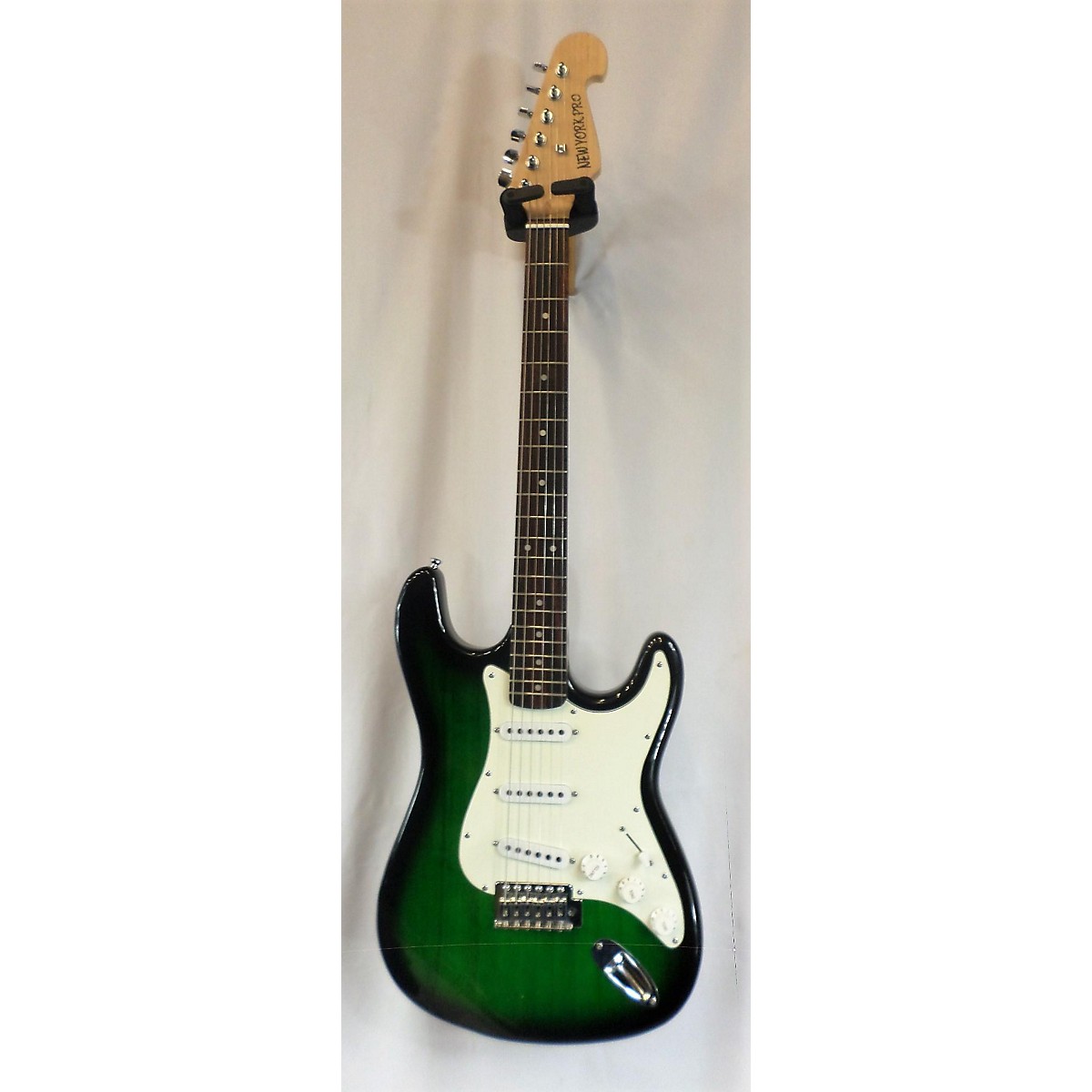 New York Pro Electric Guitar
 - Used New York Pro Double Cutaway Electric Trans Green Solid Body Electric Guitar Guitar Center